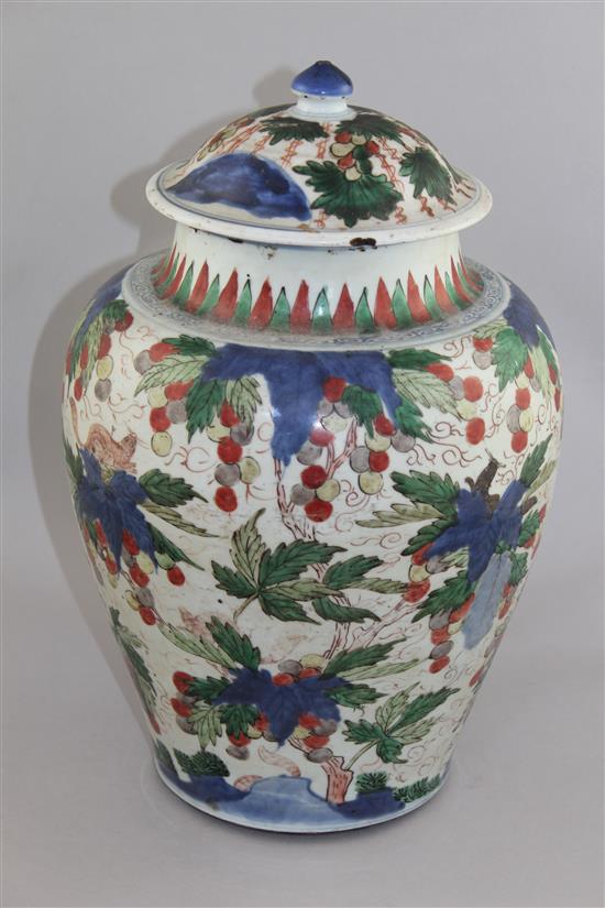 A Chinese wucai ovoid jar and cover, late 17th century, 37.5cm